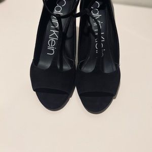 Calvin Klein open toe black suede/leather spike heel shoes.